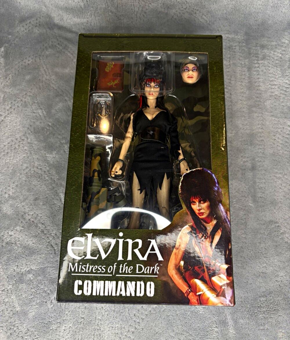 NECA Elvira Mistress of the Dark Commando Action Figure w/ Bazooka & Faces
